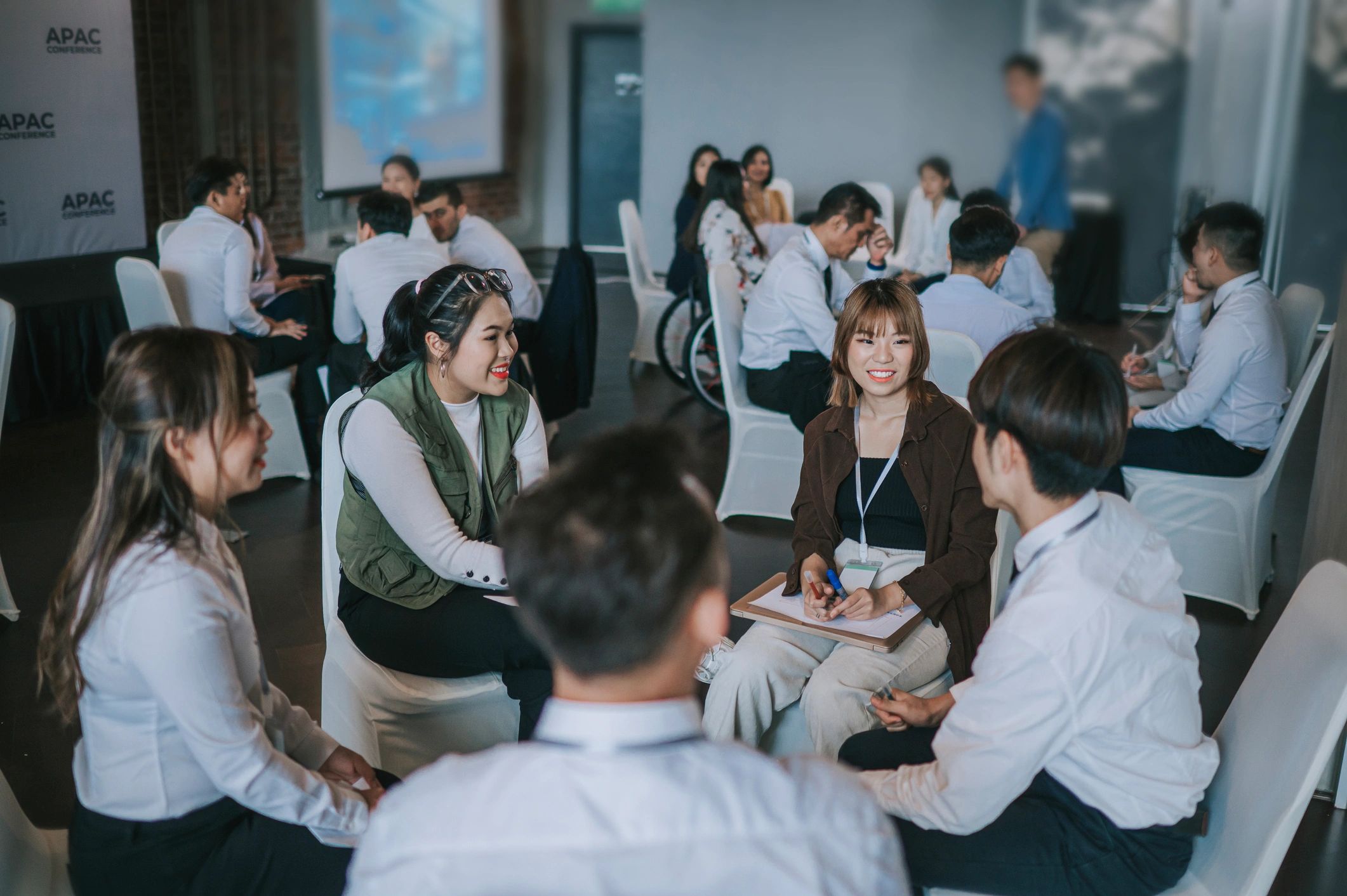 Corporate leadership workshop with professionals collaborating