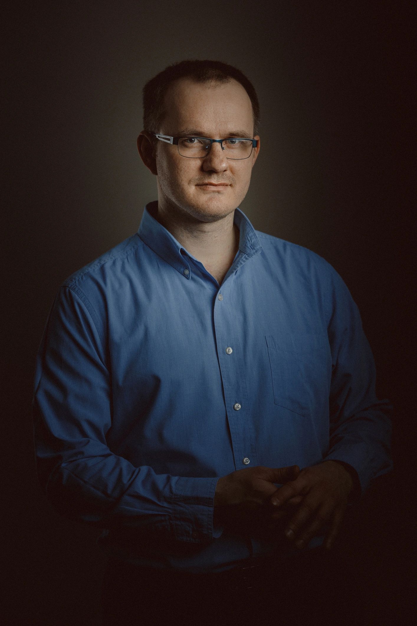Professional portrait representing senior executive mentorship